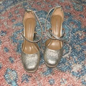 Report sparkly platform heels